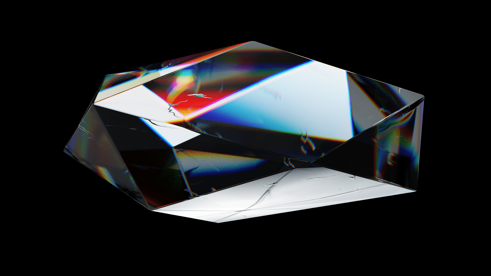 A glass crystal shard with light reflecting and reflacting off the surface producing a spectrum of varrying color.